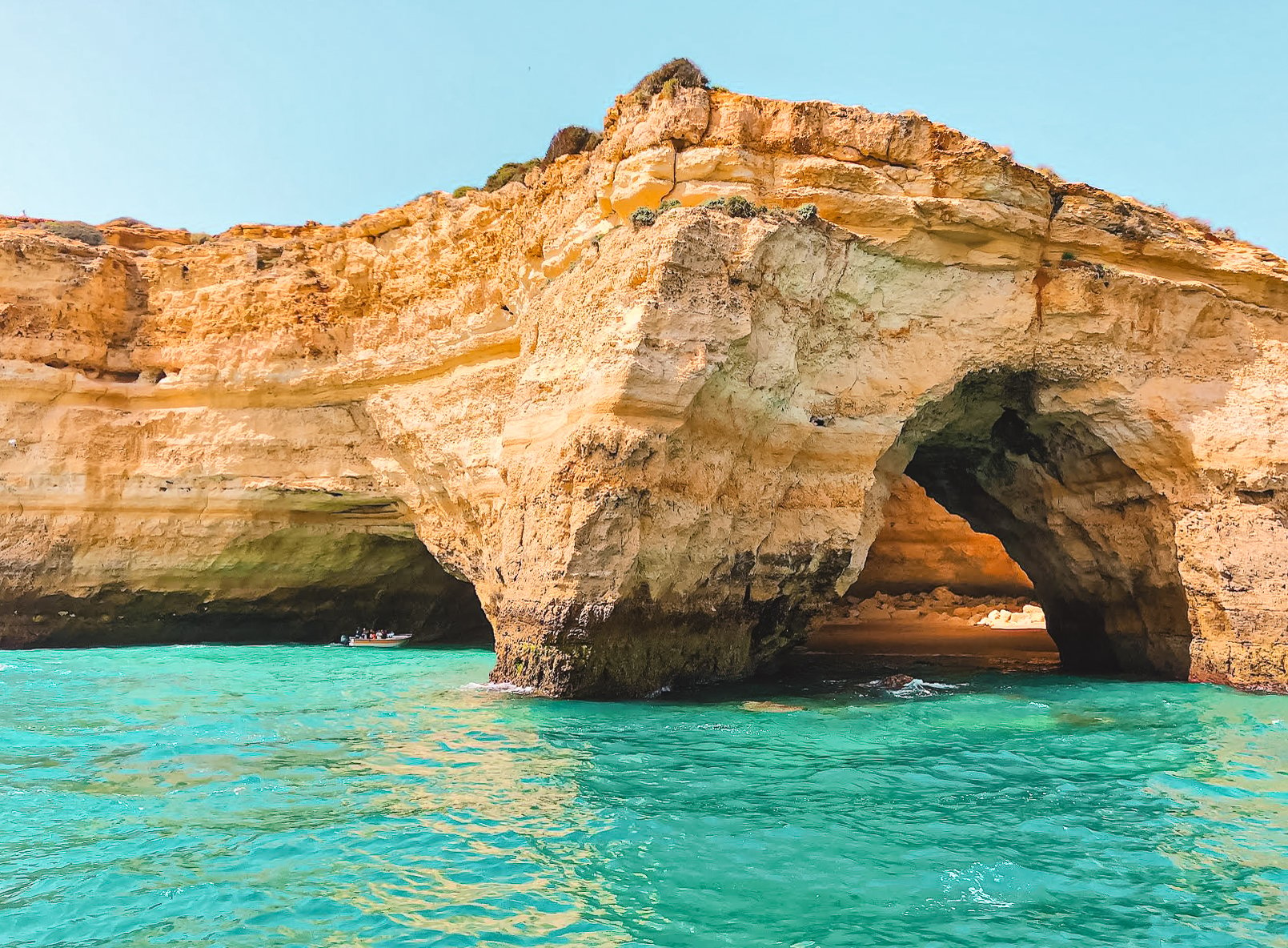 Beach hidden by sea arch