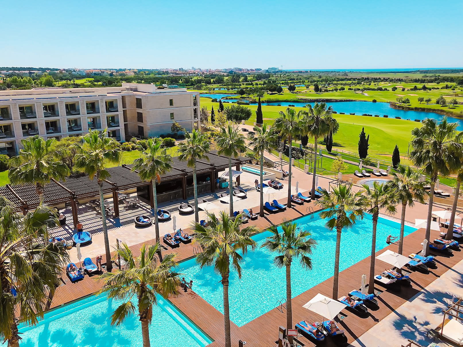 View of pool and golf course at Anantara Vilamoura