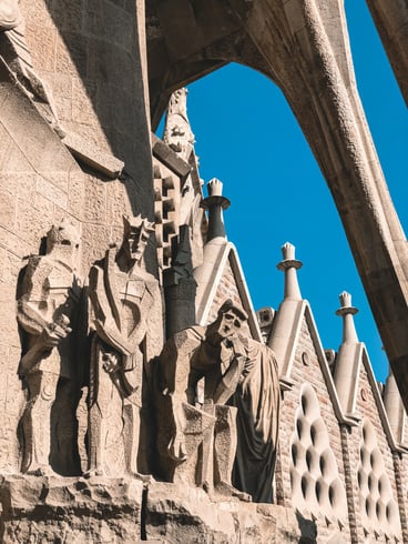 Sculptures of men on passion facade of Sagrada Familia