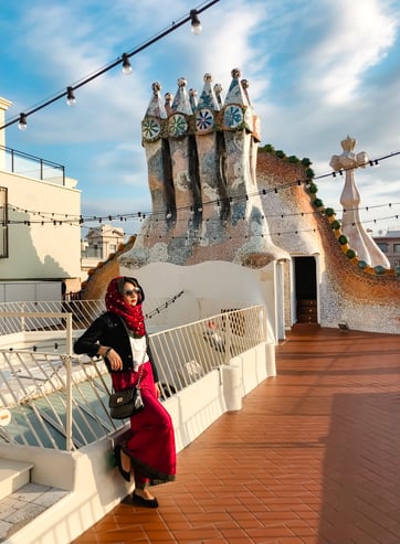 Hijabi wearing red on Casa Batllo's rooftop