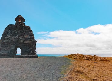 Sculpture of rocks near ocean