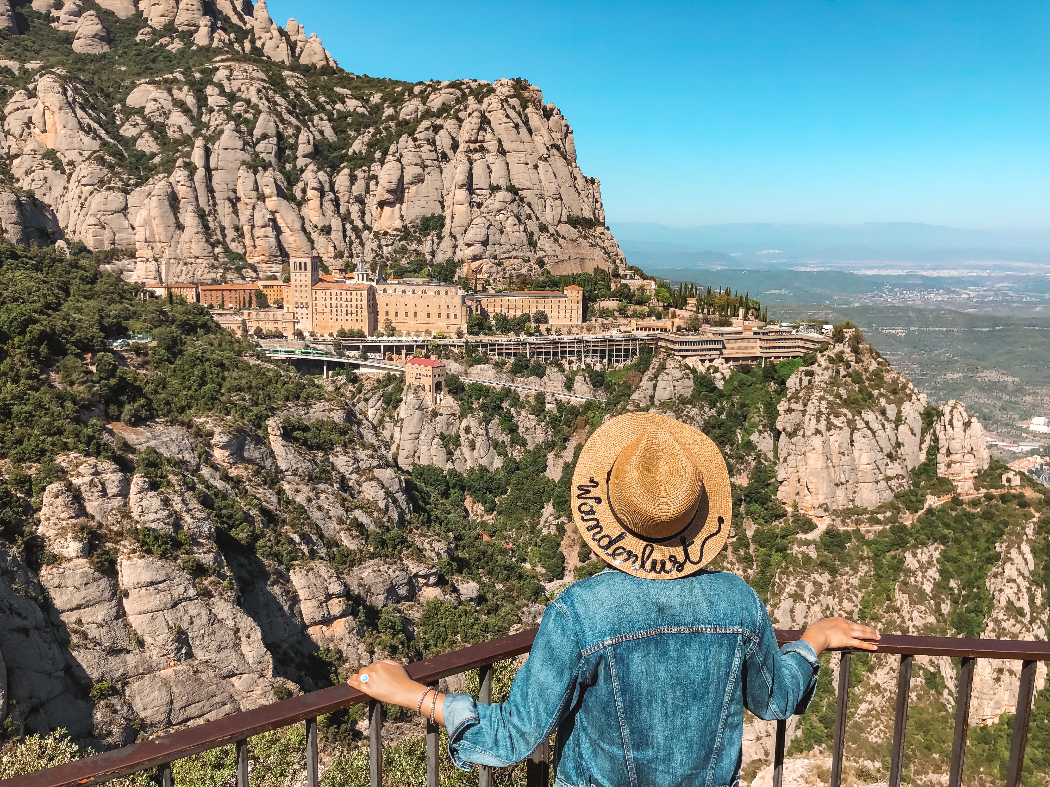 Muslim blogger looking at monastery on Montserrat mountain