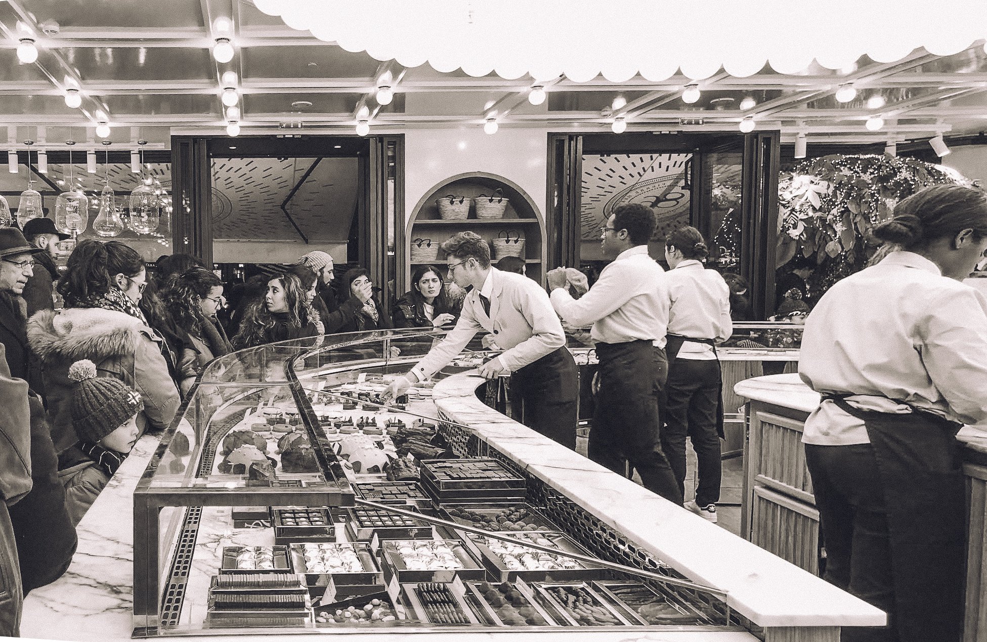 Black and white service counter at Pierre Herme in Paris