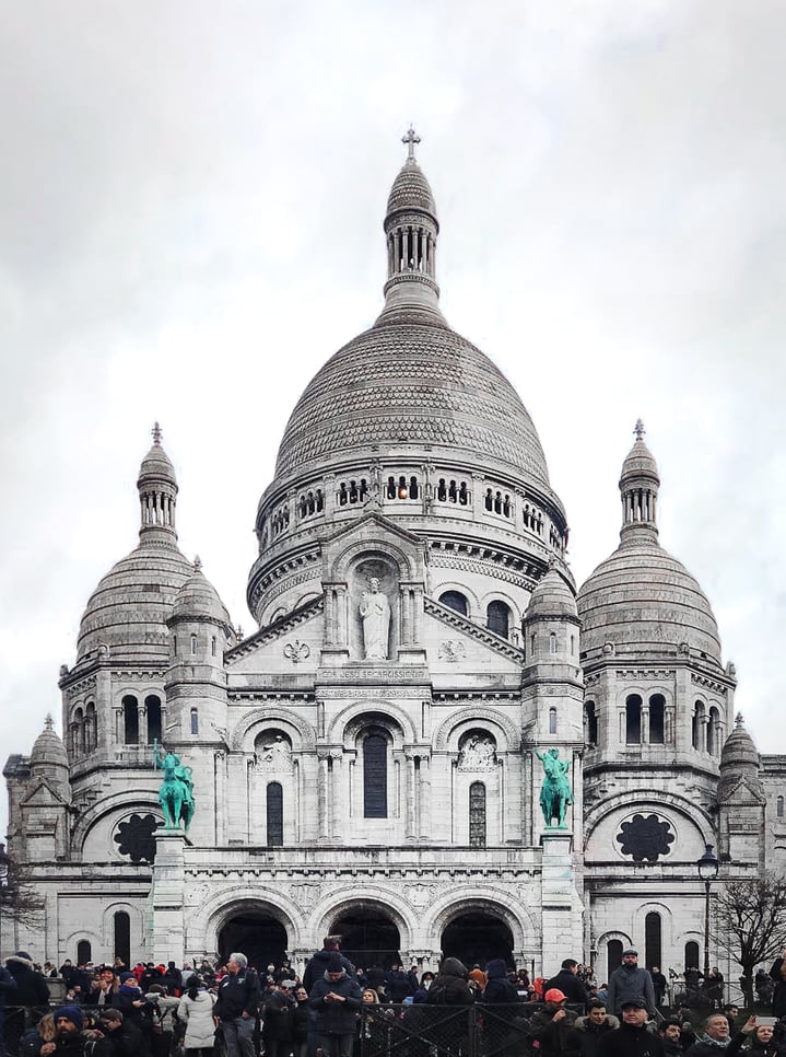 White facade of Sacré Coeur Basilica 