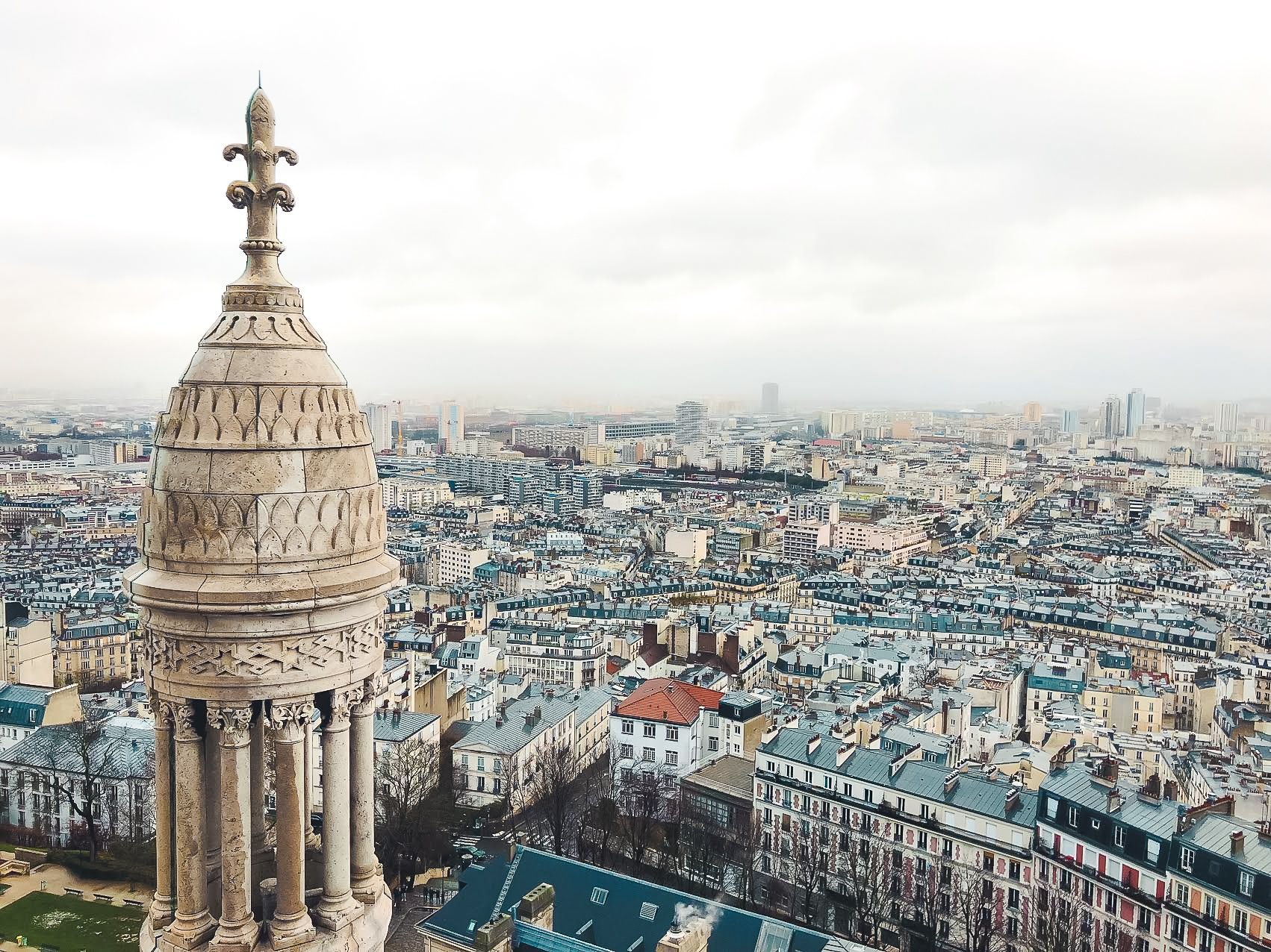 White dome of Sacré-Cœur Basilica and Parisian skyline