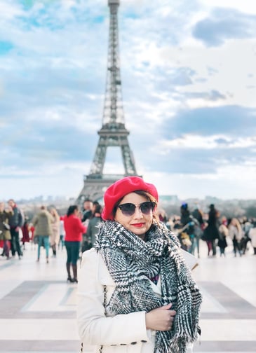 Muslim travel blogger with Eiffel Tower