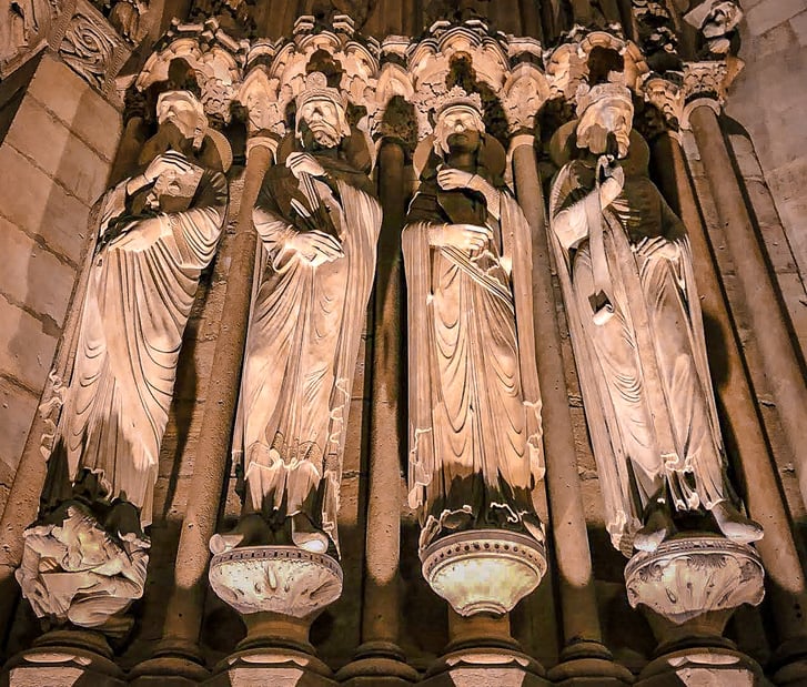 Sculptures of men on Notre-Dame facade 