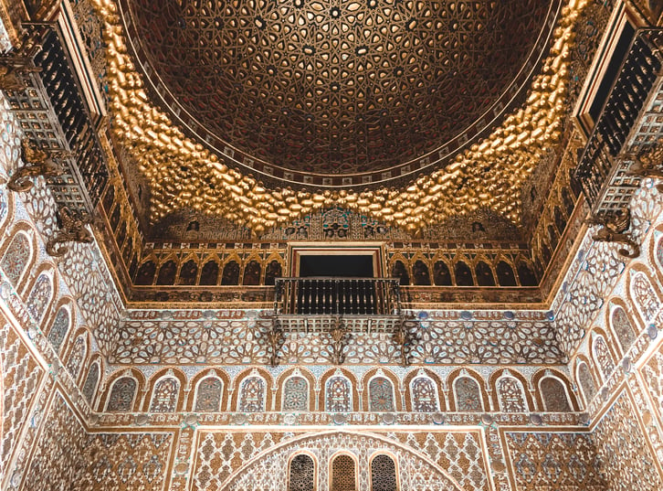 Gold domed ceiling with muqarnas in Seville Alcazar