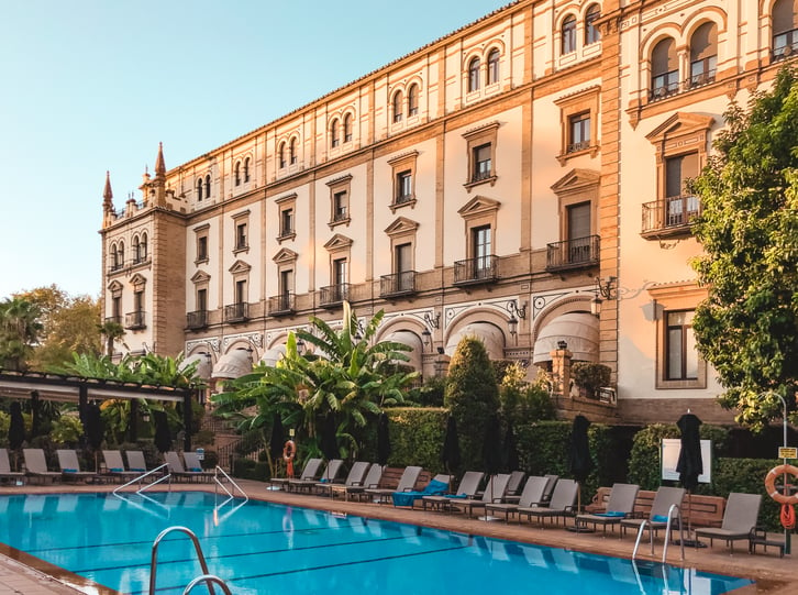 Hotel Alfonso facade and pool in Seville
