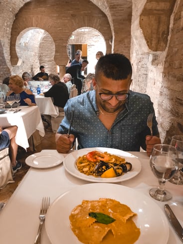 Paella and pasta at rustic Seville restaurant