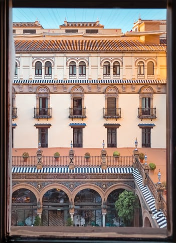 View of courtyard from window at Hotel Alfonso Seville