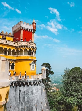 Red Pena Palace tower on mountain in Sintra