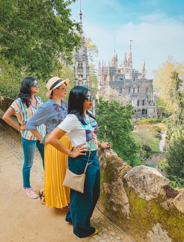 Muslim blogger posing at Quinta da Regaleira in Sintra Portugal