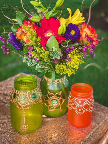 Eid-picnic-centerpiece-flowers-mehndi-mason-jars